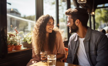 Young couple smiling while on a date