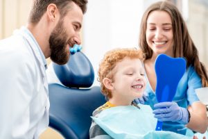 young kid in the dentist chair