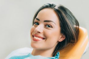 Woman smiling in dental chair