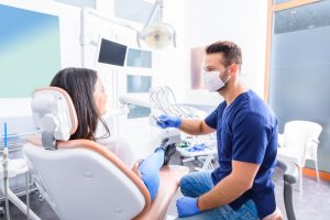 woman visiting dentist in Long Island City