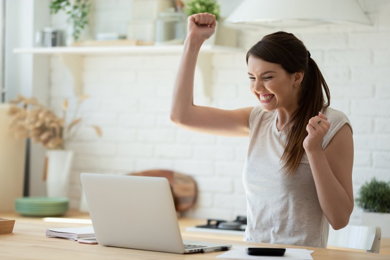 woman excited about tax refund in Long Island City