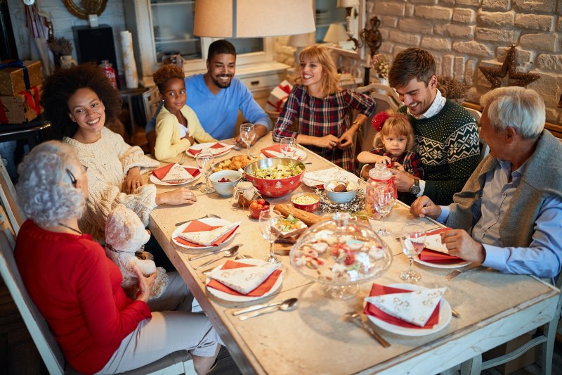 family having dinner over the holidays