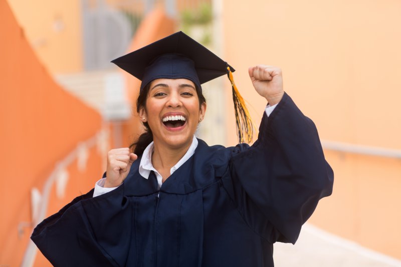 A young woman celebrating her graduation