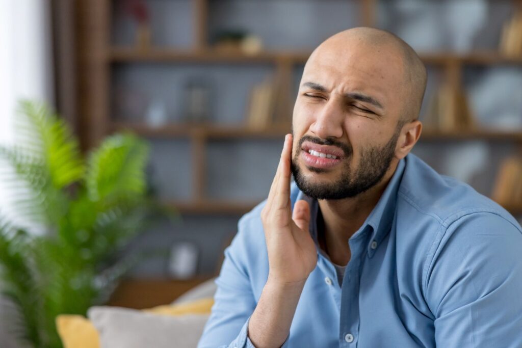 A man with a painful toothache